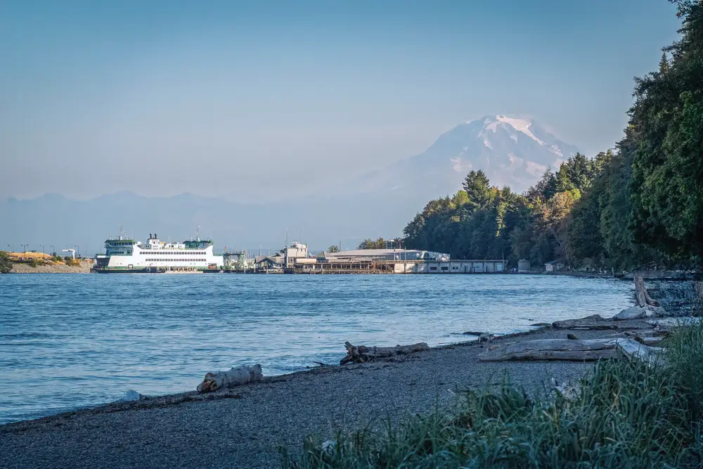 Mount Rainier above a ferry dock and shoreline